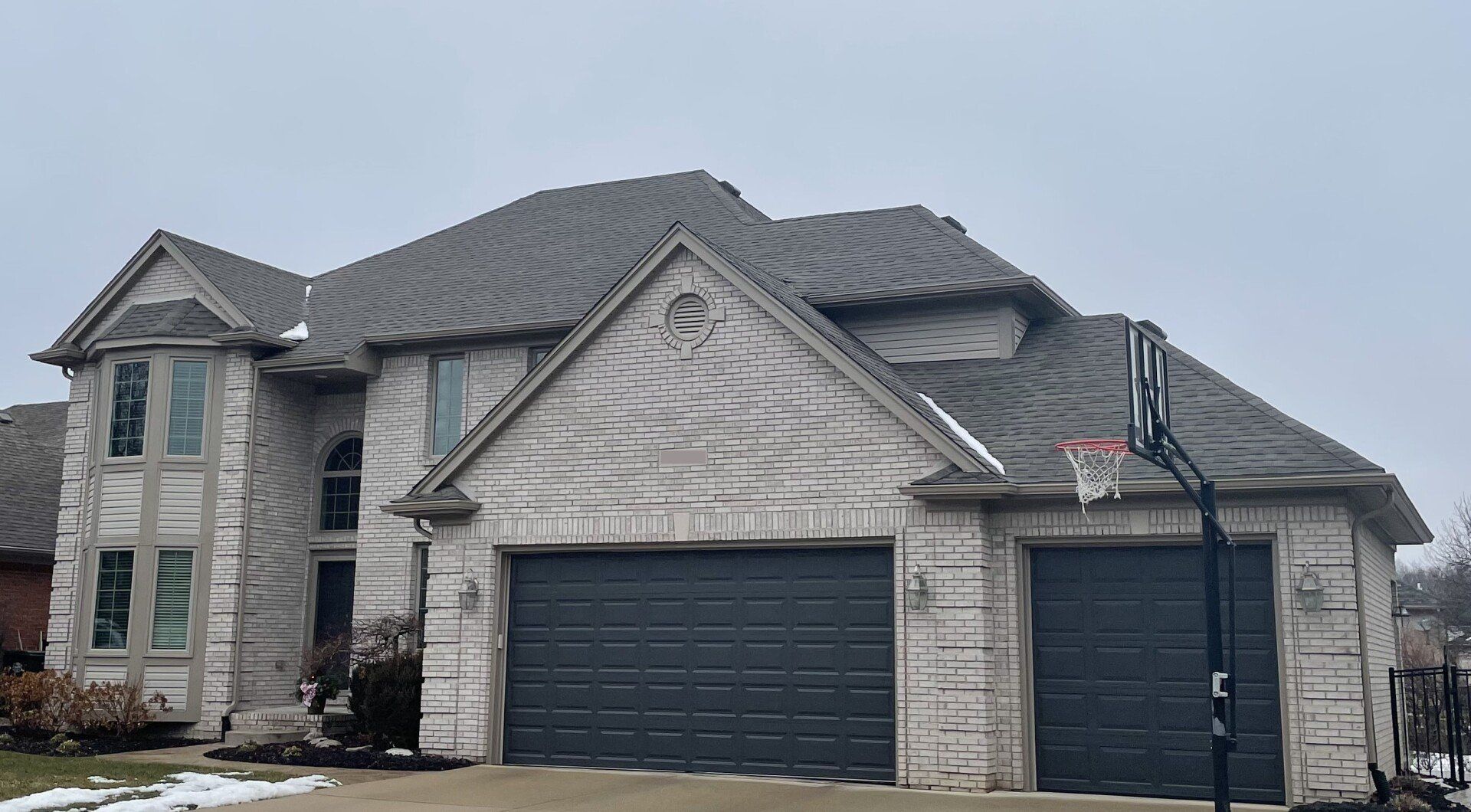 Front Side of the House With Newly Installed Roof. Roofing Contractor Detroit. Roof Repair Near Me in Lansing