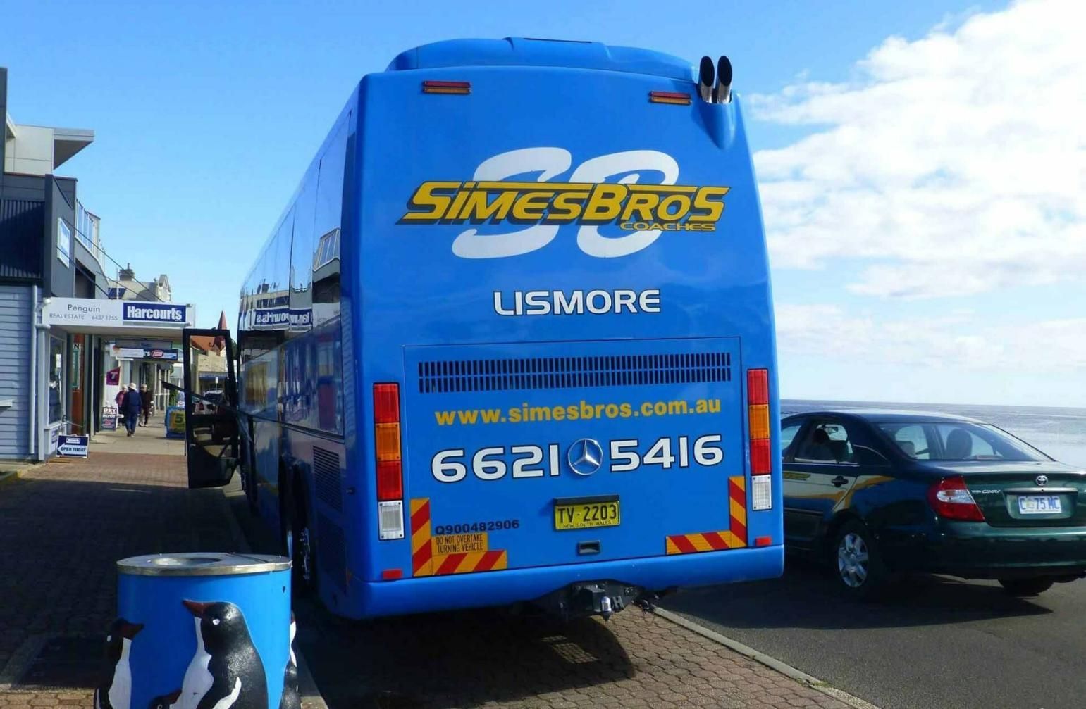 A Blue Bus that Says Simes Bros on The Back — Simes Bros Coaches in South Lismore, NSW