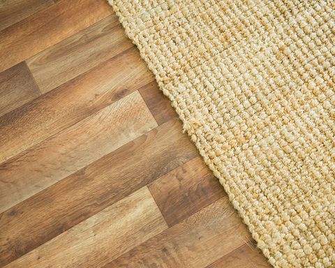 Wooden floor and rug background image