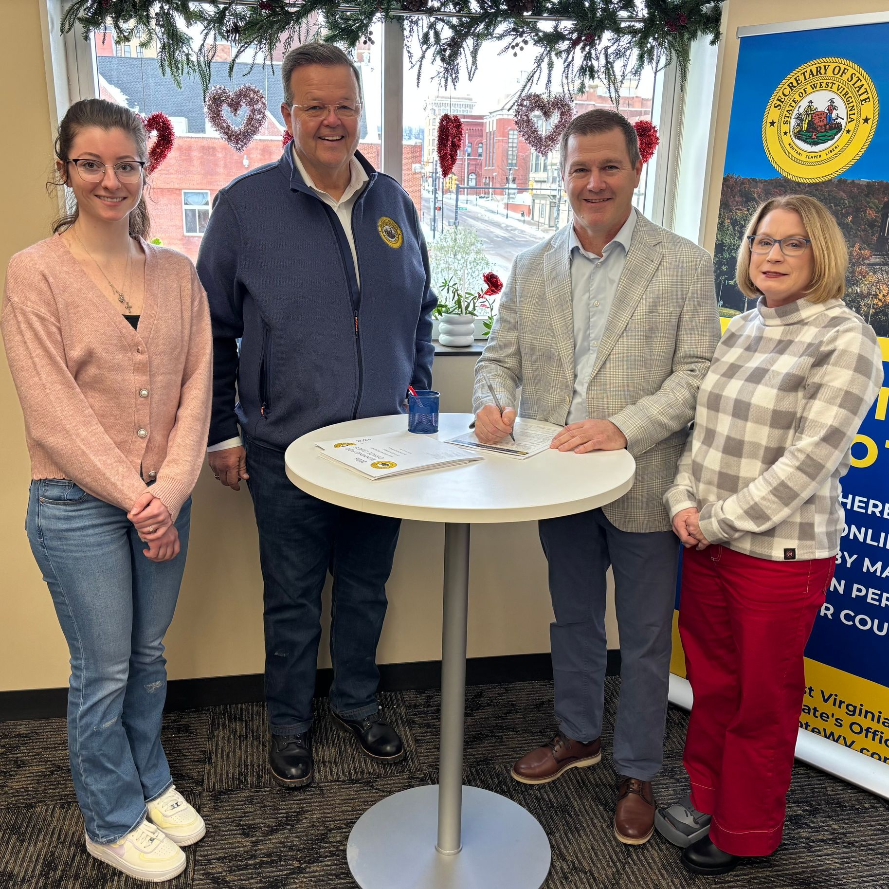 Jason Harshbarger signing petitions