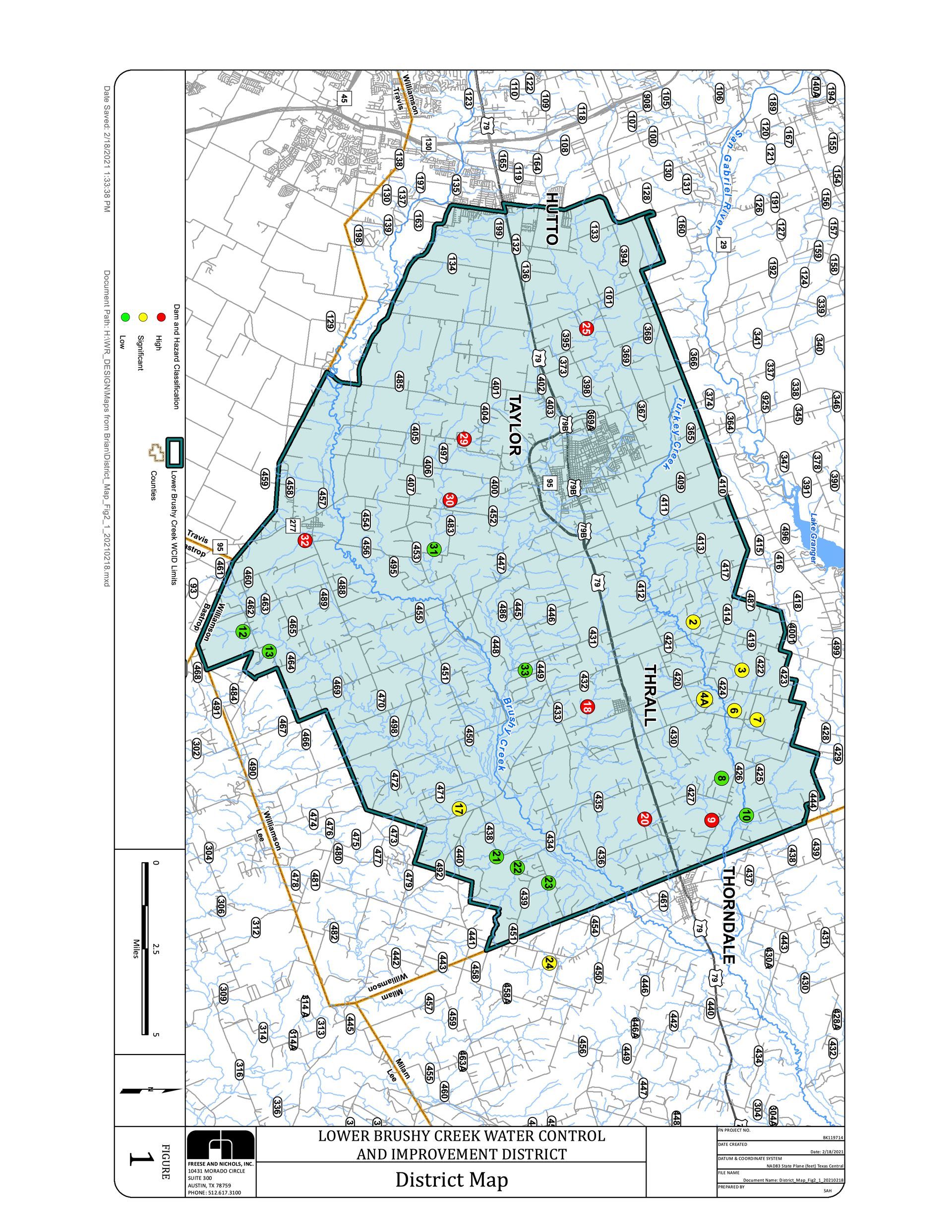 A topographic map showing a blue-shaded geographic area with various colored markers indicating different points of data.