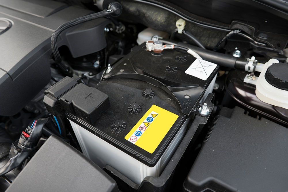 Car battery under the hood of a vehicle — Sundance Auto & Machinery Pty Ltd In Midge Point, QLD 