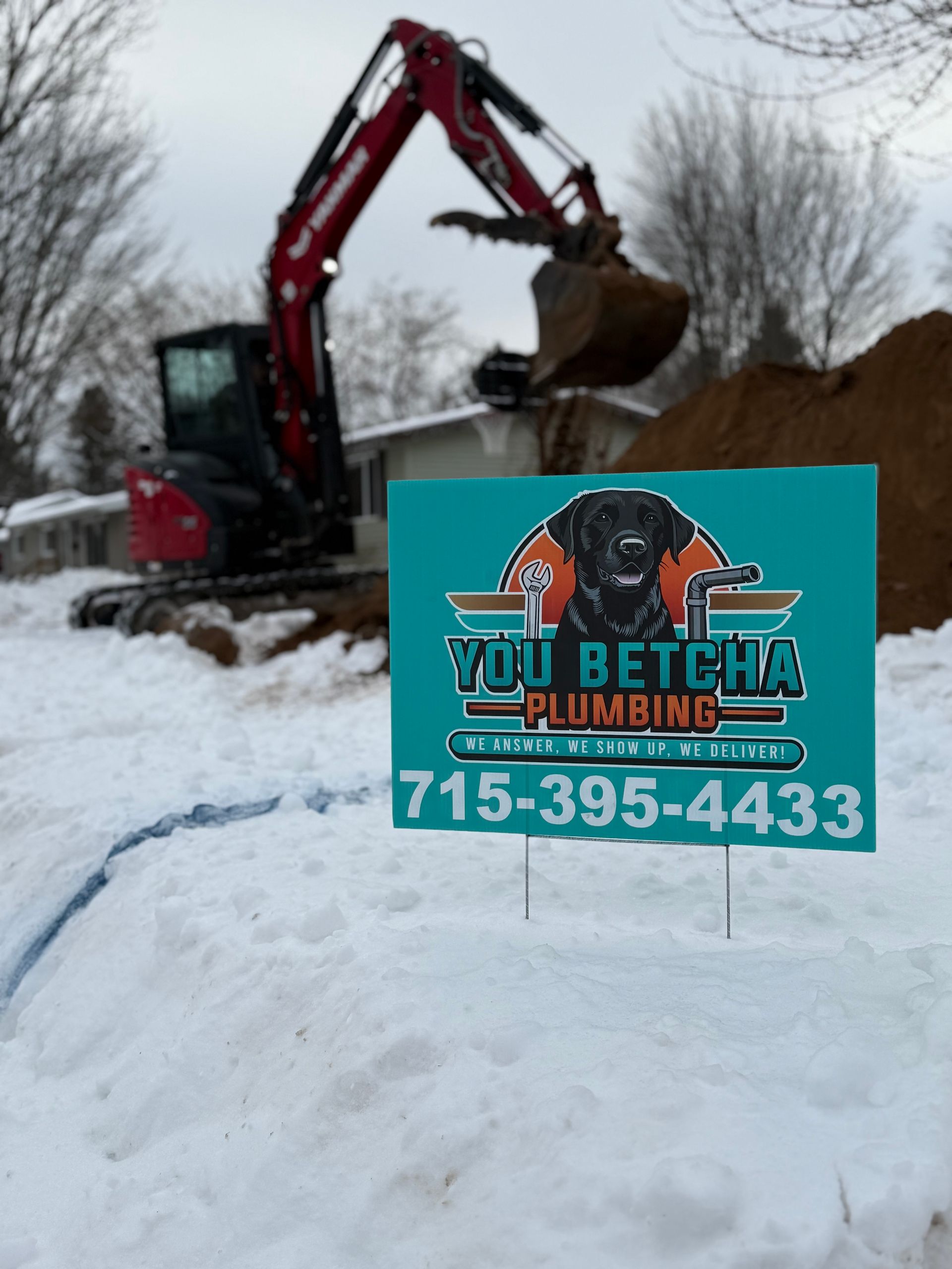 A sink is sitting under a cabinet in a bathroom.