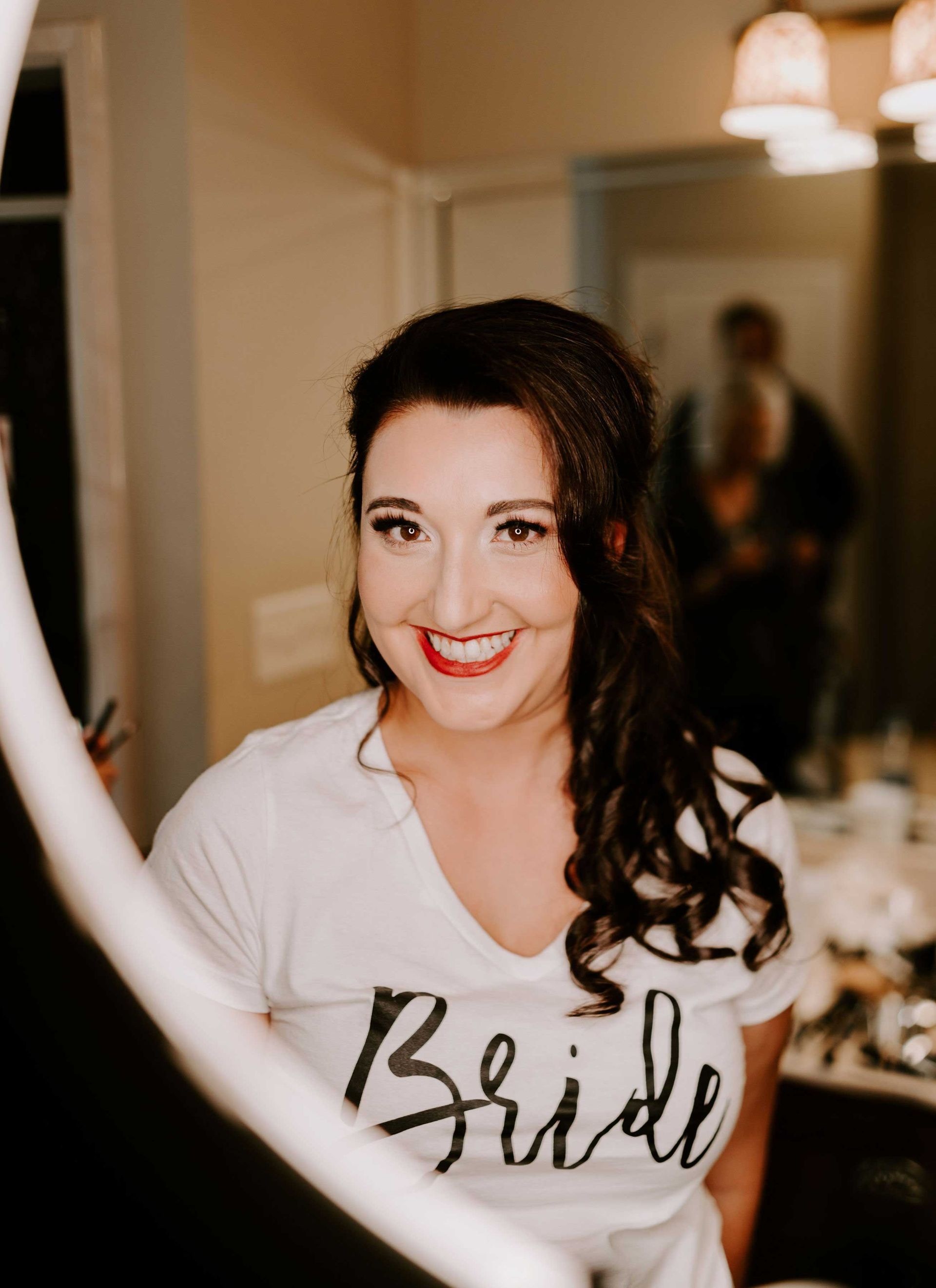 Bride in a white shirt with 