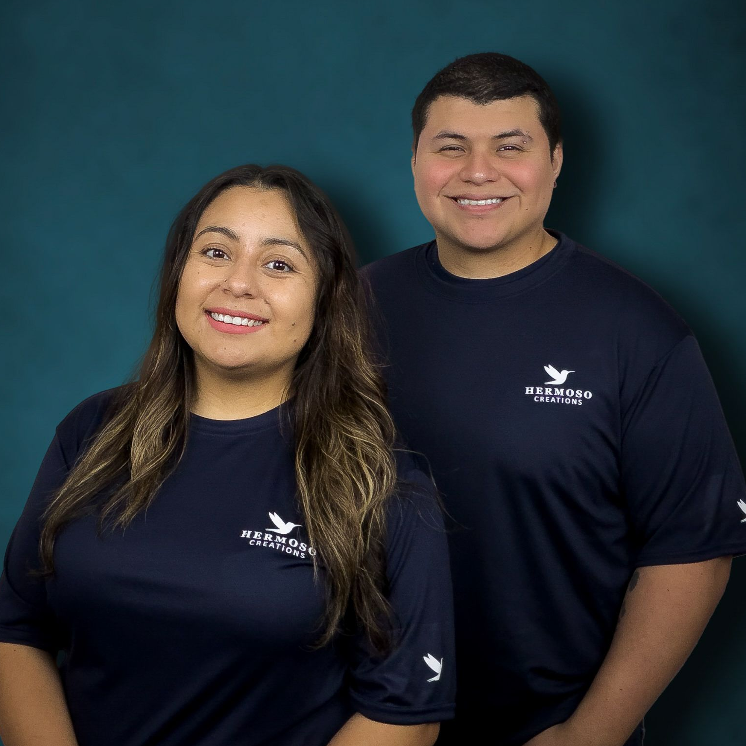 Laura Martinez and Albert Hermoso, founders of Hermoso Creations, a Dallas-based marketing agency helping local businesses with intentional content and storytelling.