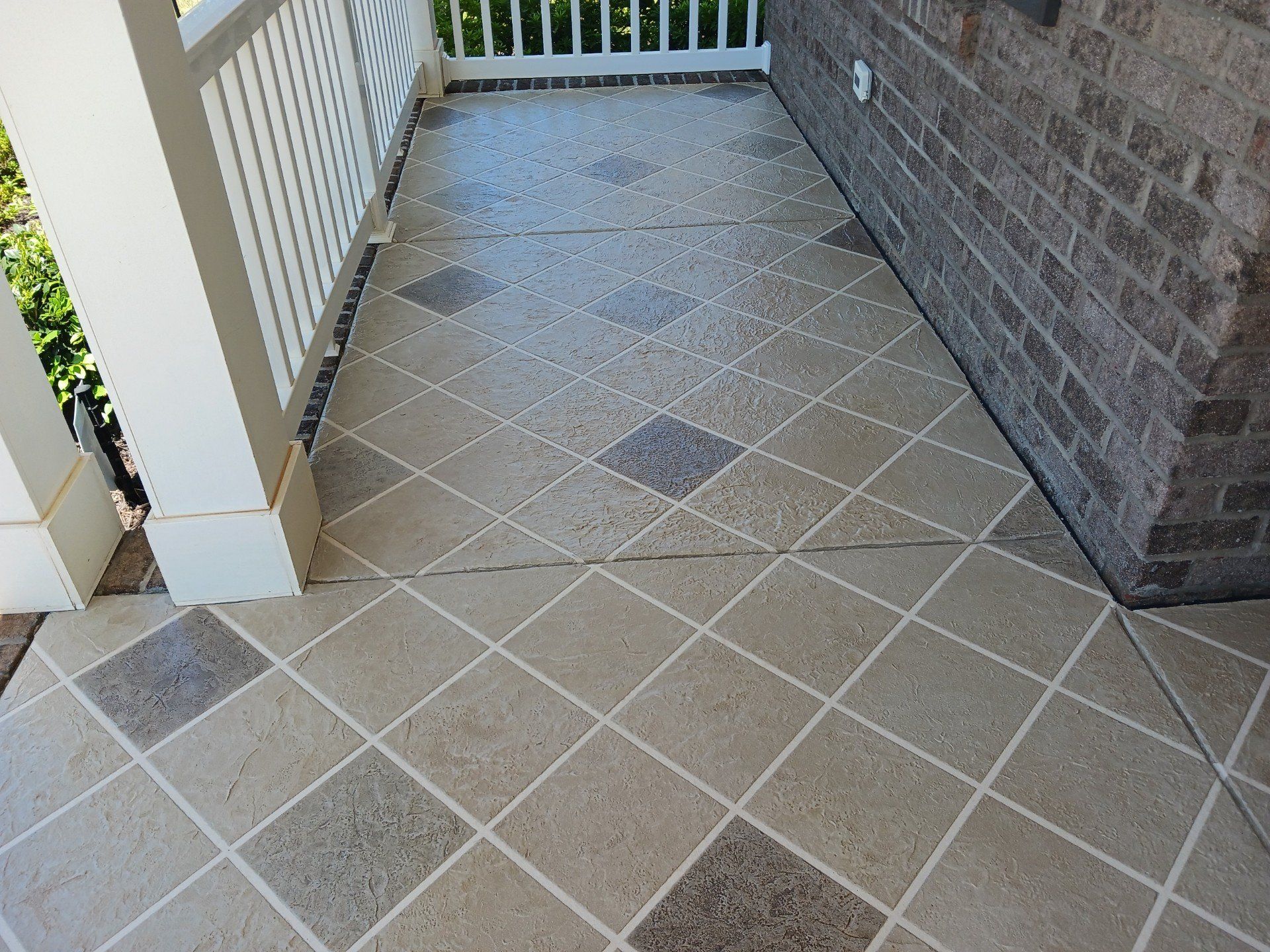 A Floor With Diamond Pattern Design — Kannapolis, NC — Rodriguez Decorative Concrete Coating