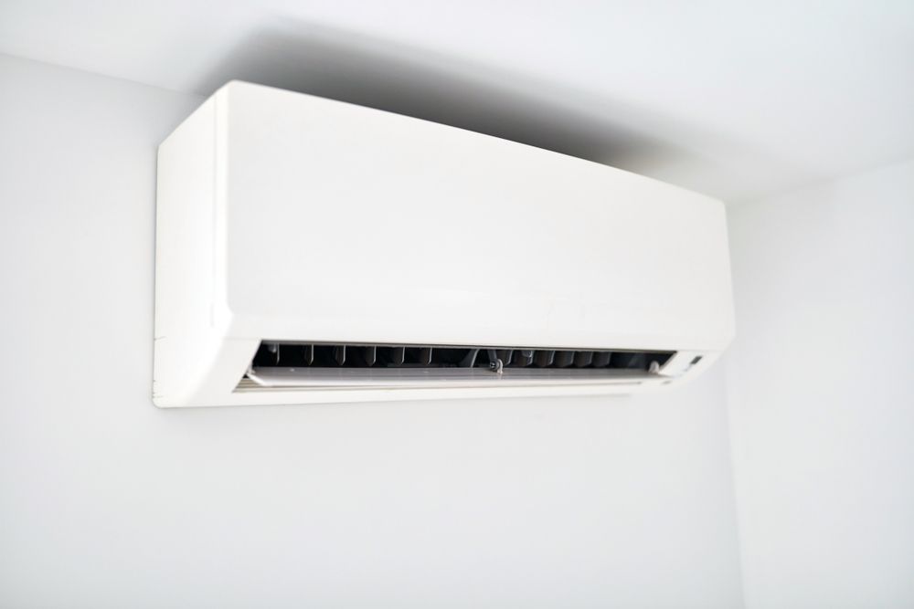 A White Wall-mounted Air Conditioning Unit Installed — Premiair Refrigeration, Air Conditioning & Electrical in Tamworth, NSW
