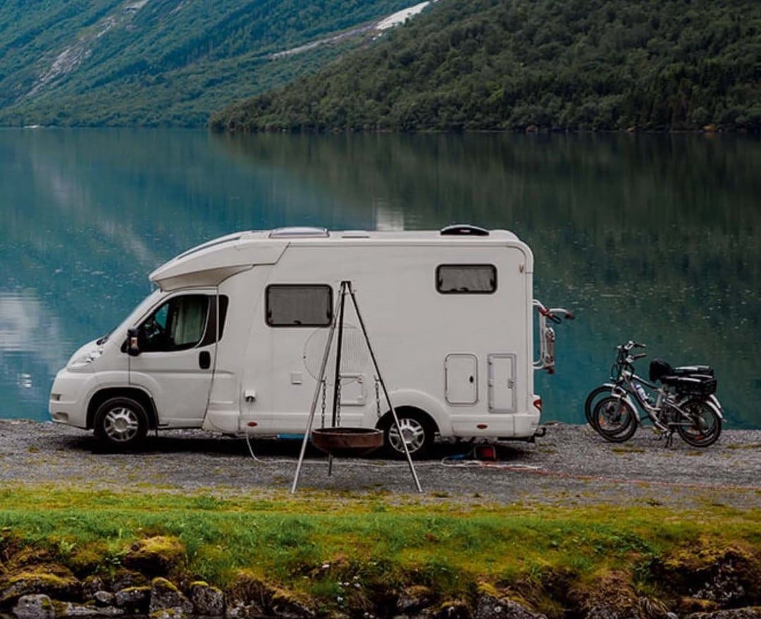 A White Camper Van Parked by a Serene — Premiair Refrigeration, Air Conditioning & Electrical in Tamworth, NSW