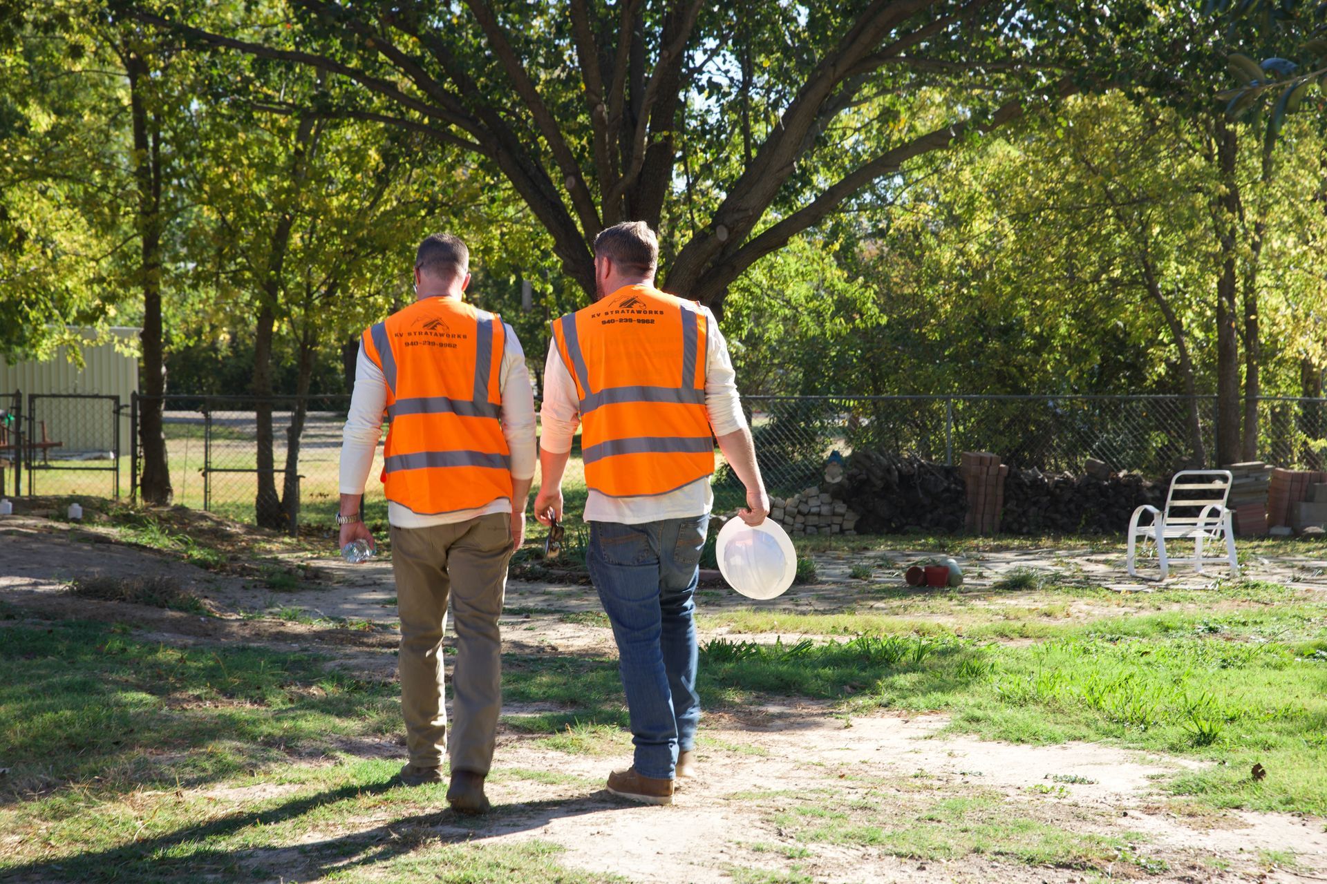 KV Strataworks team reviewing project plans and discussing next steps at the job site.