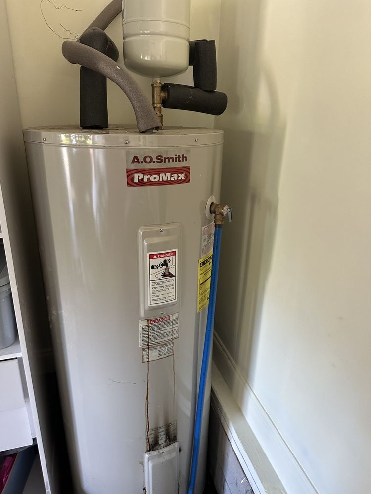 Residential water heater installation with A.O. Smith ProMax unit in Wilmington, NC