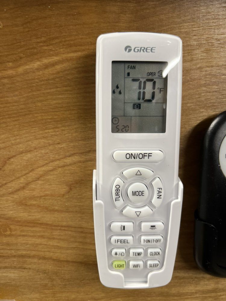 Gree mini split HVAC system remote displaying temperature at 70°F