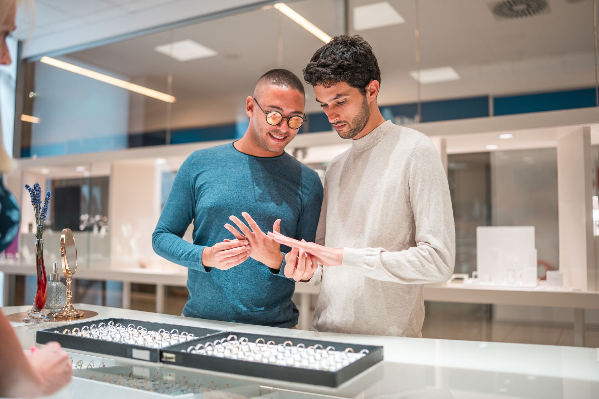 A pair of men gay men searches for jewelry.