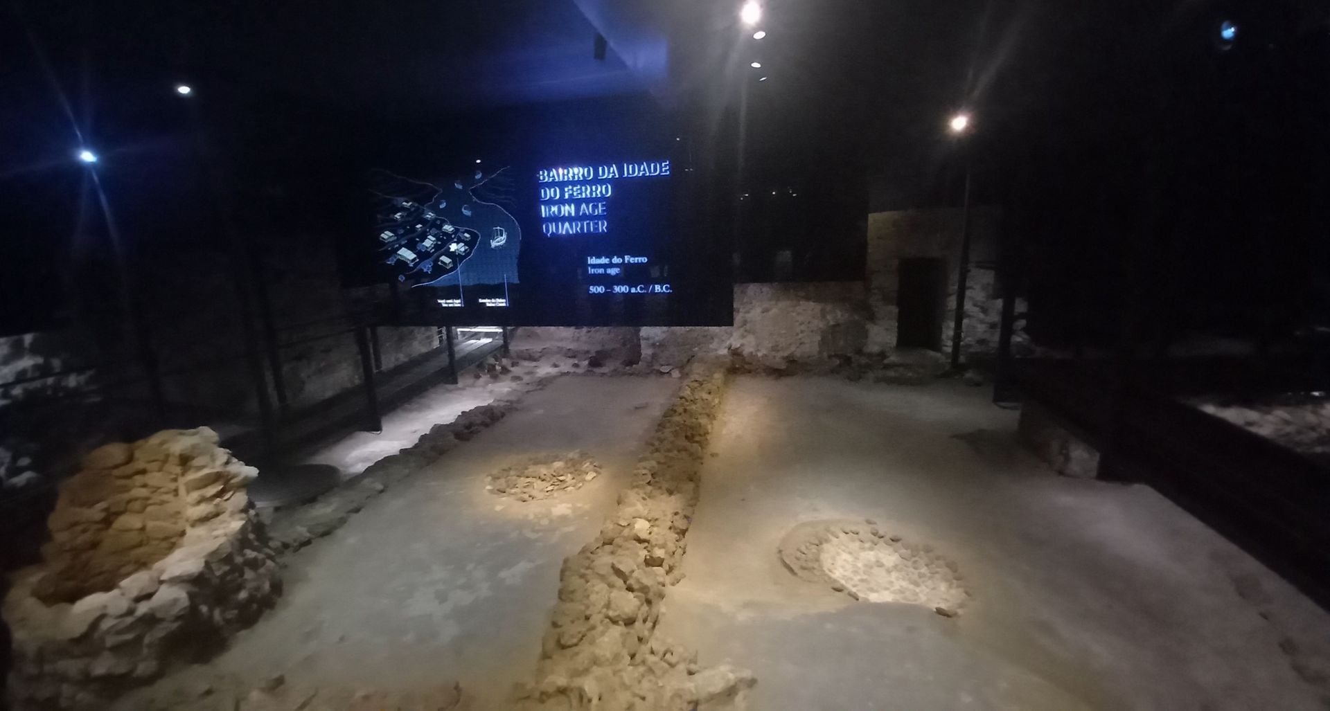 A stone path in the mountains with mountains in the background