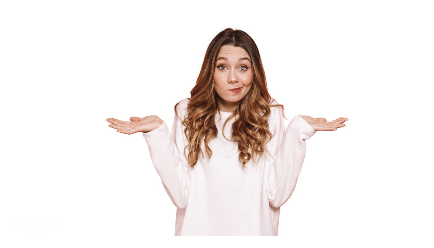 A woman in a white sweater is shrugging her shoulders.