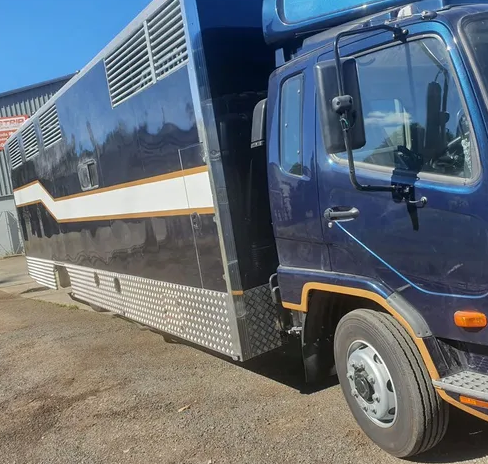 Blue truck being repaired — Castledine's Truck Painting & Repairs in Fountaindale, NSW
