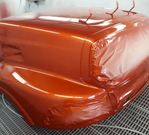 Truck being spray painted — Castledine's Truck Painting & Repairs in Fountaindale, NSW