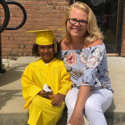 Little Faces Learning Center Graduate and Teacher