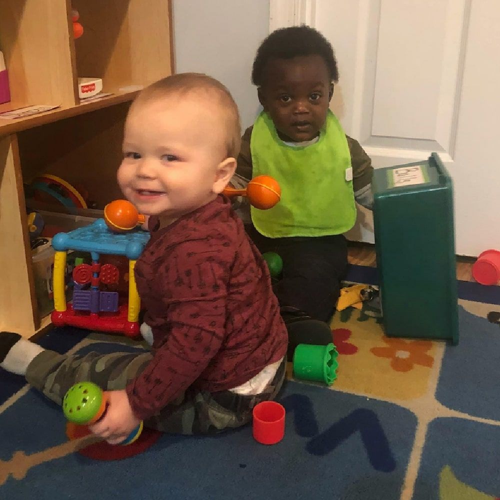 toddlers play with blocks at the learning center