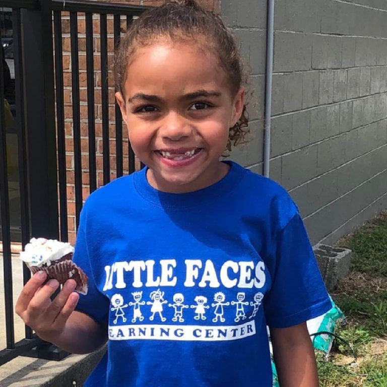 student enjoy a cupcake at the learning center