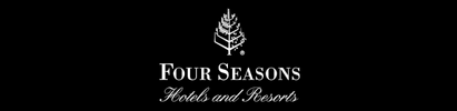 Four Seasons Hotels and Resorts logo with a stylized leaf on a black background.