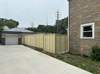 House with Fence — Erie, PA — Advanced Roofing and Construction