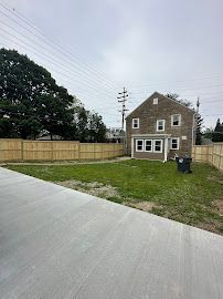 Brown House with Lawn — Erie, PA — Advanced Roofing and Construction