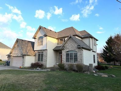 White Brick House — Erie, PA — Advanced Roofing and Construction