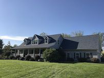 Front House with Garage Doors — Erie, PA — Advanced Roofing and Construction