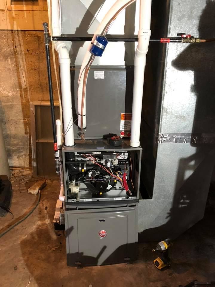 Heating and Cooling System Being Installed in A Basement | Sullivan, MO | Williams heating and cooling