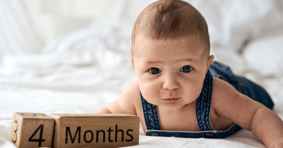baby and a 4 month sign