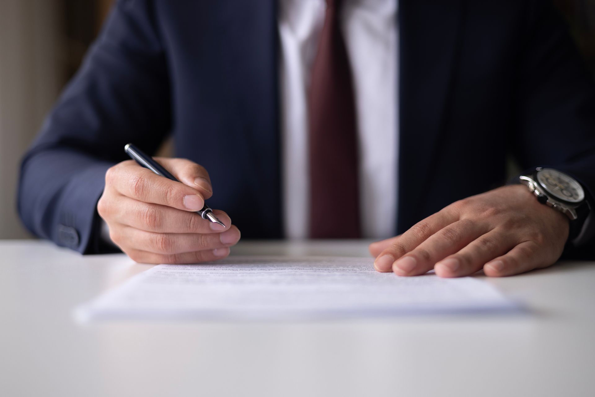 Close-up of lawyer hands, representing social security disability legal paperwork details. Close up of documents, official forms and paperwork, showcasing social security disability.