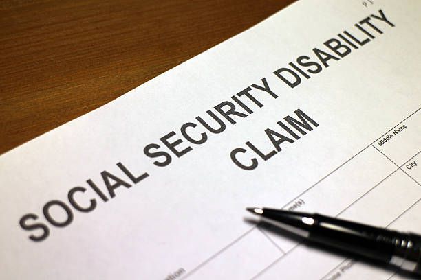 Close up of documents, official forms and paperwork, showcasing social security disability.