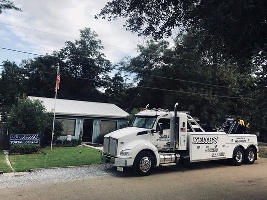 Emergency Towing Service — Company Towing Truck in Mandeville, LA