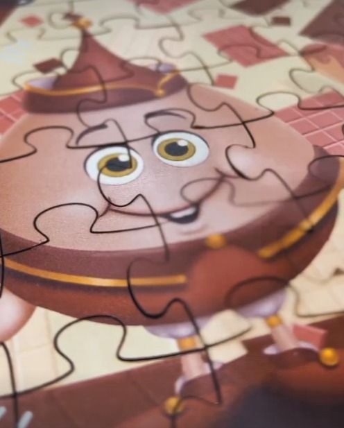 um close de um quebra-cabeça com um personagem de desenho animado