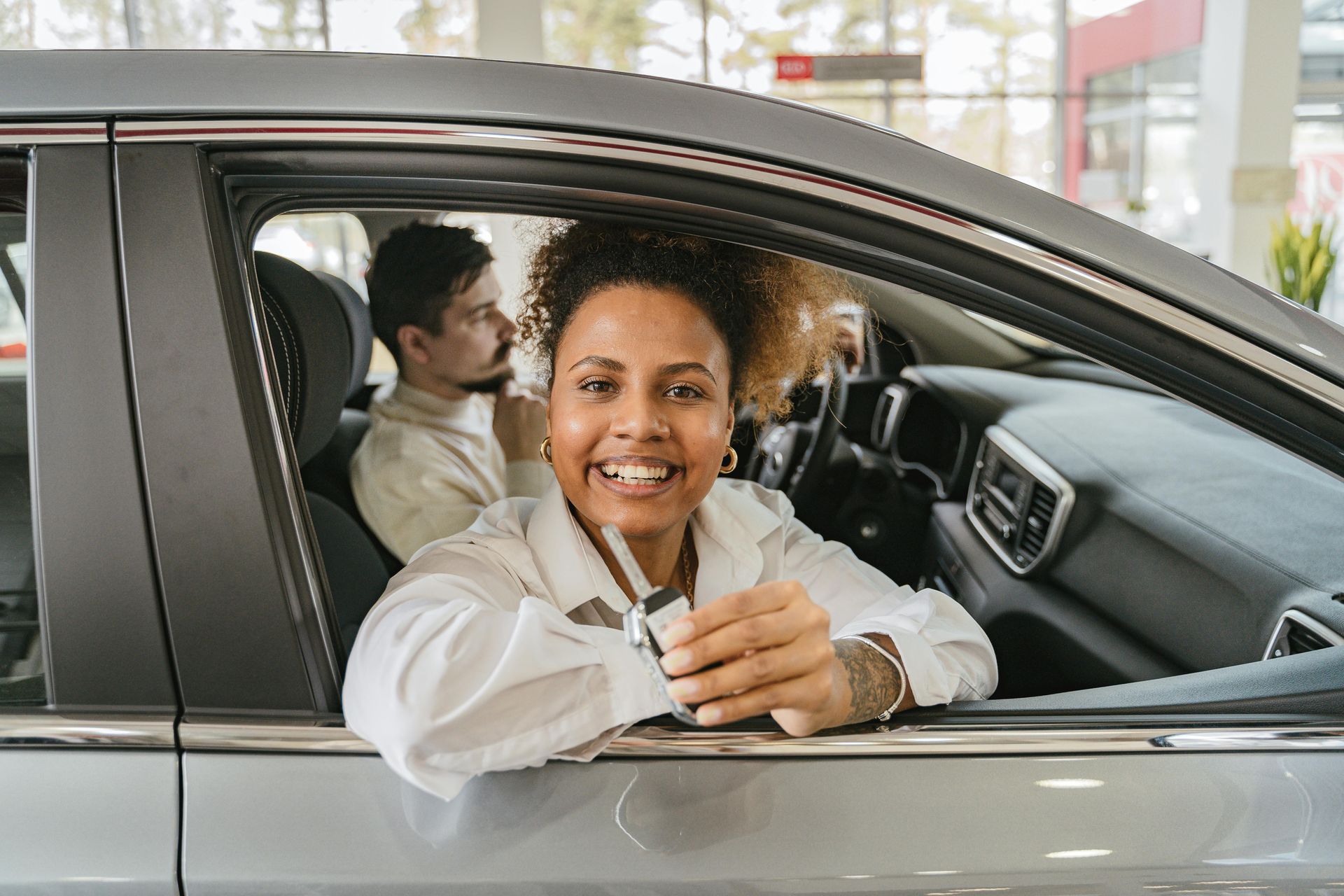 Test driving a car at car dealership