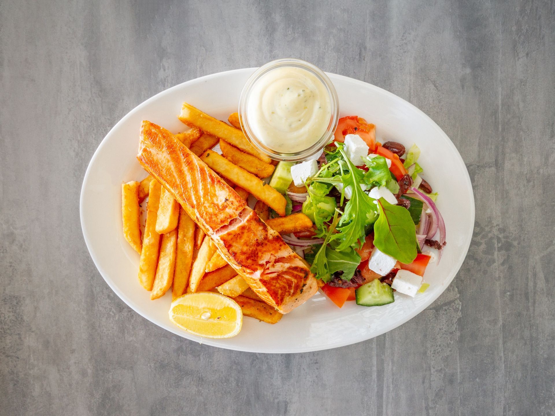 Salmon with chips and salad at Kingfisher seafood cafe Toowong Brisbane 