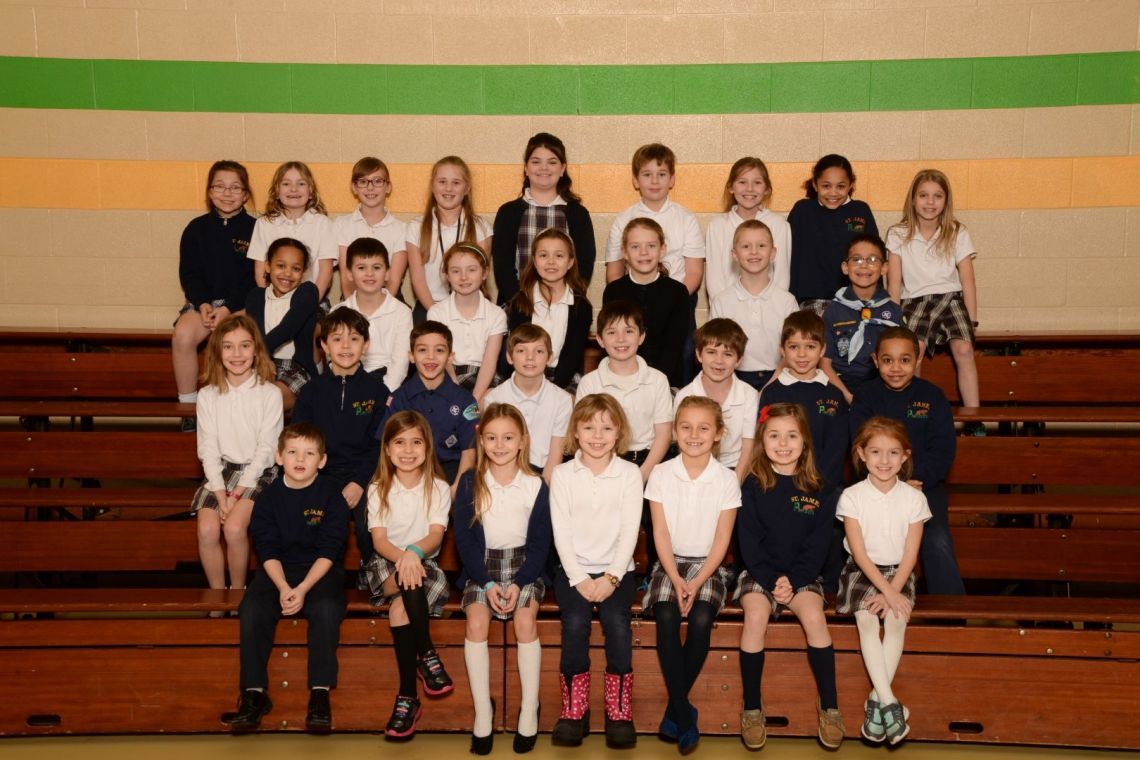 A group of children are posing for a picture