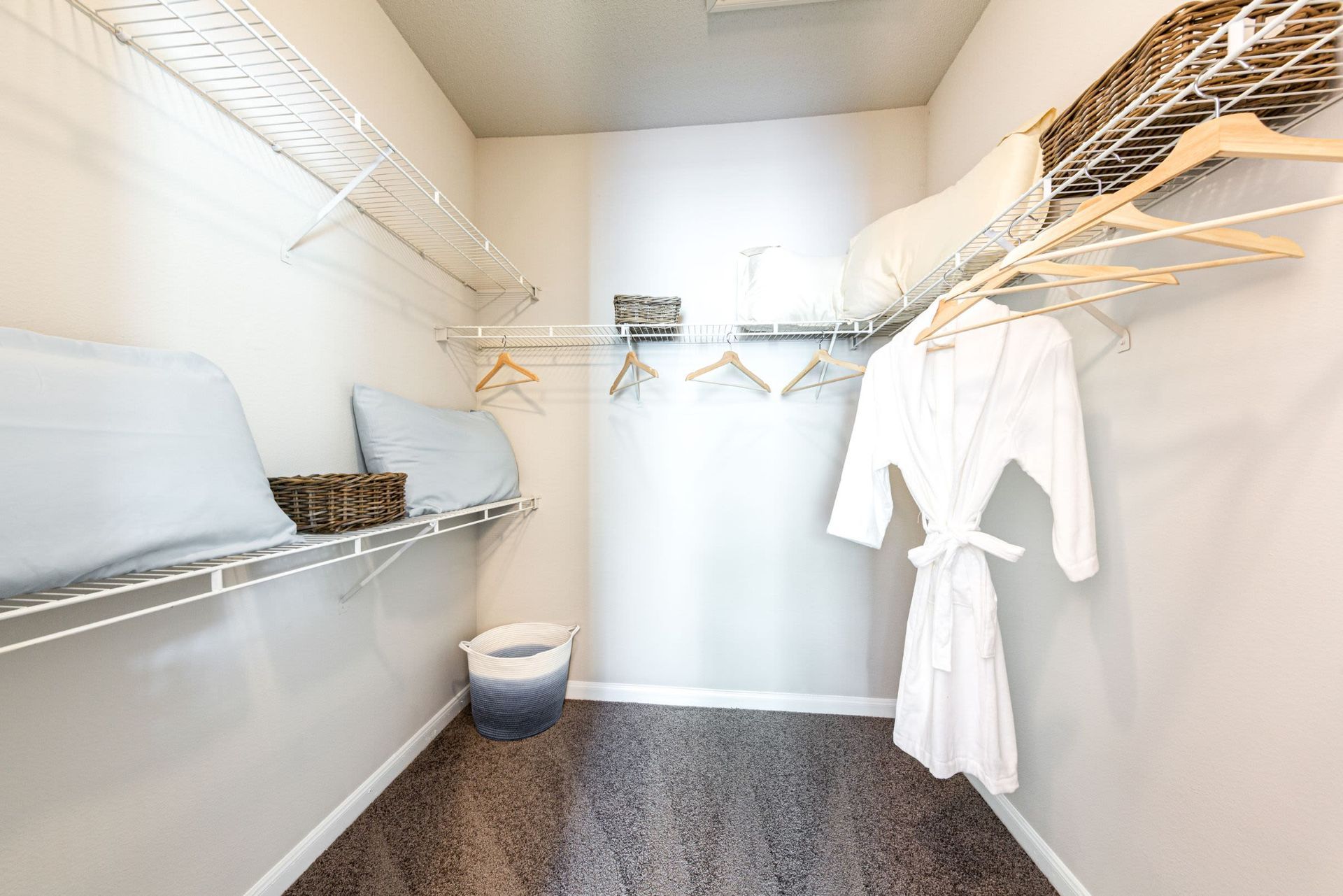 Walk-in closet at Marquis at Westchase in Houston, TX.