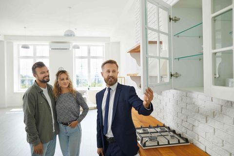 Person closing the door on a custom cabinet
