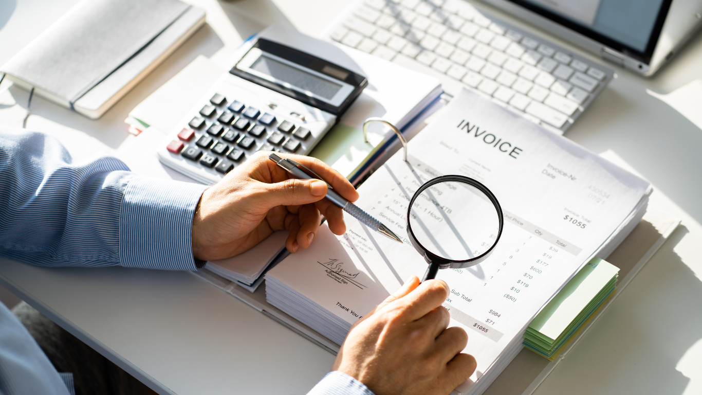 A person is taking a dollar bill out of their wallet.