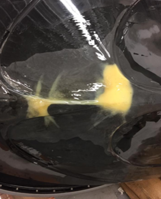 A black object with a yellow stripe on it