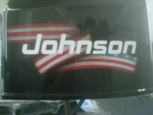 A johnson logo is on the back of a boat