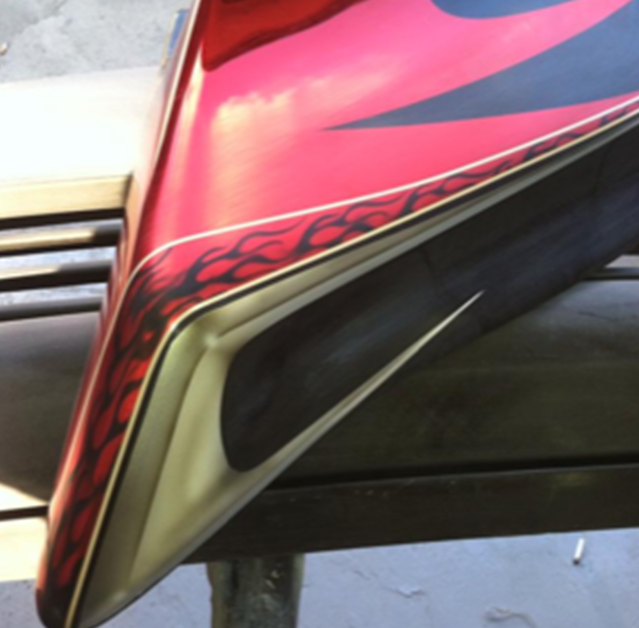 A red and black item with flames on it