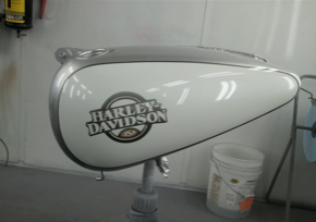 A harley davidson motorcycle is sitting on a table