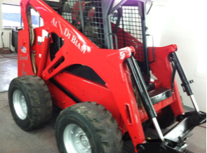 A red skid steer with the word bianca on the side