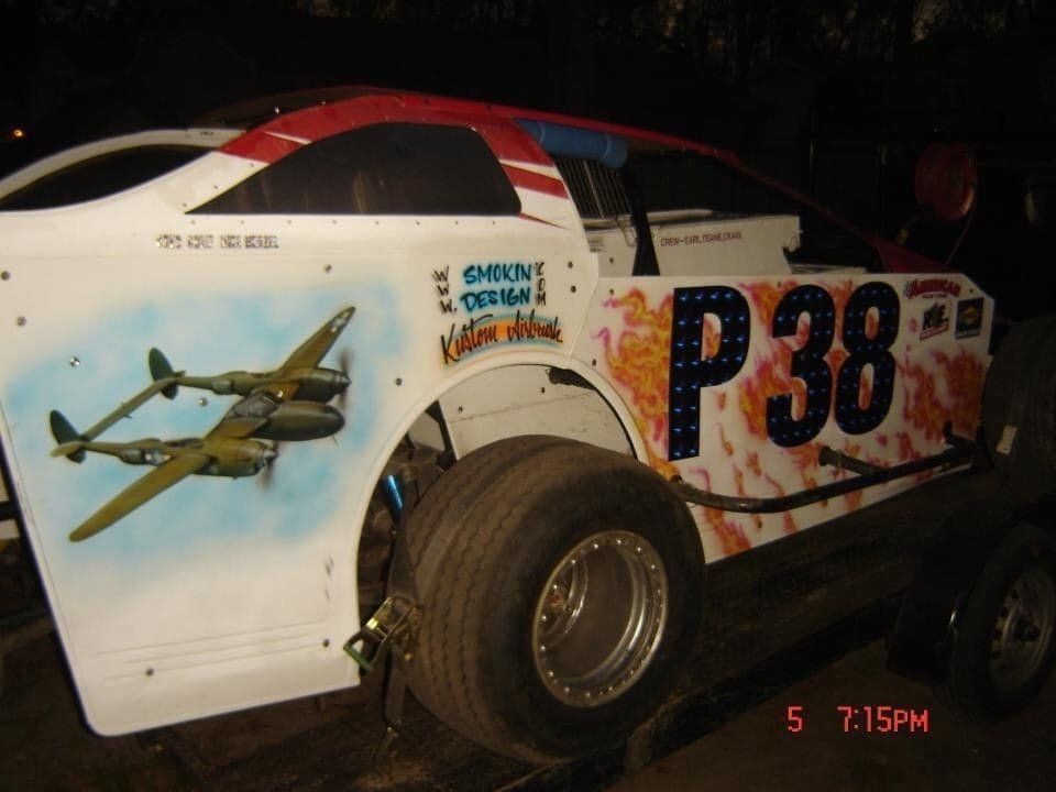 A race car with the number 38 painted on it