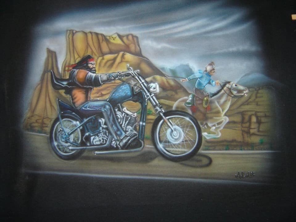 A painting of a man riding a motorcycle next to a man on a horse.