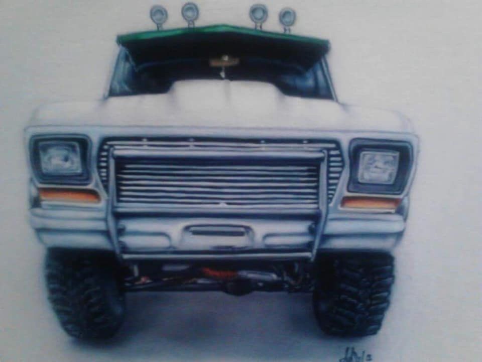 A drawing of a truck with the hood up