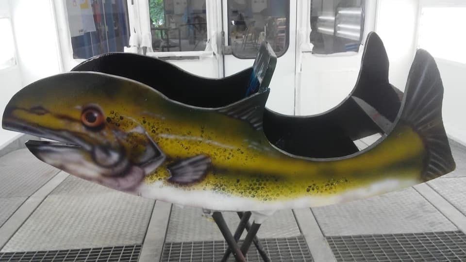 A carousel ride in the shape of a fish