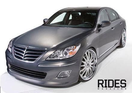 A gray car with the word rides on it